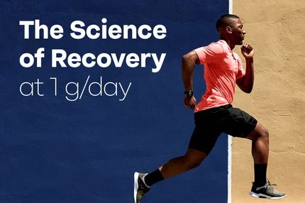 Runner in a pink shirt sprinting past a blue and tan wall with text reading “The Science of Recovery at 1 g/day.