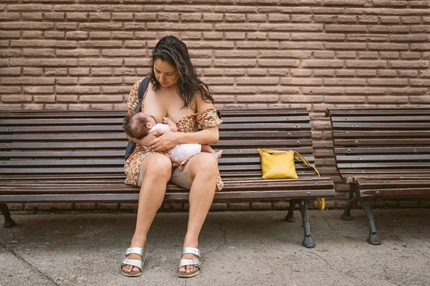 Image woman breastfeeding her baby in public