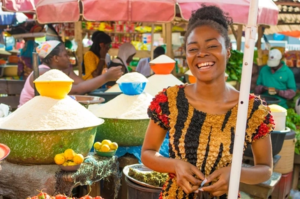 Image Woman shopping in an African food market