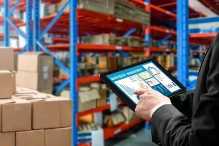 Image Person with tablet in packagign warehouse