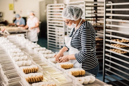 Image Worker on food packing line.