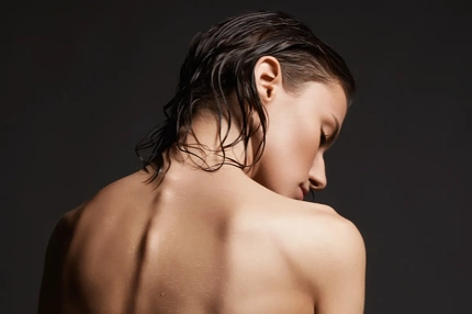 Image woman with spine poking out back