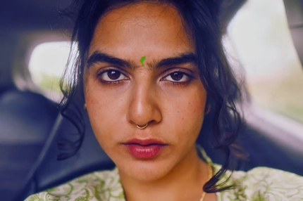 Image Indian woman sitting in her car