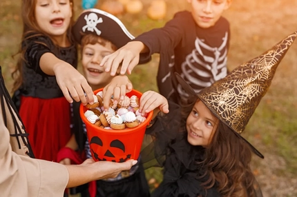children taking candies at halloween
