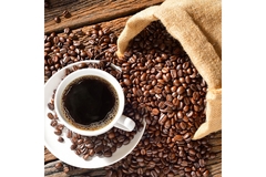 Image A cup of coffee and coffee beans