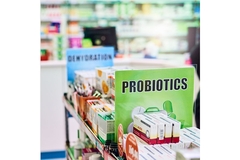 pharmacy shelf display featuring probiotics supplements and digestive health products in retail store