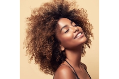Image A lady with beauty brown afro