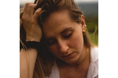 A lady looking sad