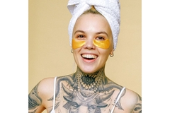 Image smiling woman with tattoos