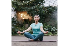 Image Older woman doing a relaxation exercise.