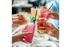 Image People clinking glasses of alcohol.