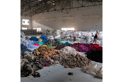Image Warehouse full of clothing.