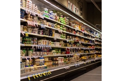 Image Supermarket aisle with dairy yogurts.