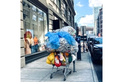 Image shopping cart full of trash in new york