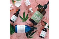 Image bunch of cbd products on pink background