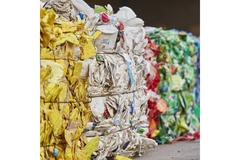 Image piles of waste bundled up for recycling