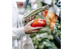 Image Person shopping for vegetables.
