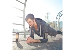 Image Athlete doing a plank exercise.