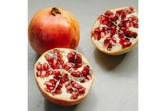 Image A sliced pomegranate.