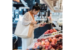 Image Woman shopping for berries.