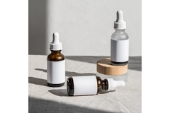 Image Thee unbranded skin serum bottles.