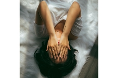 Image Woman struggleing with mental issues feeling sad and laying in bed