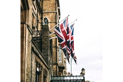 UK flags hanging from a building