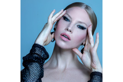 Image Model with heavy eye make up posing