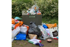 Image Overflowing bin with plastic waste
