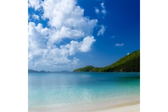 beach with ocean and land on the right
