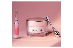 Image Leti 7714 Triple Lift-up Up Anti-Aging Cream jar next to metal spatula and micro capsule formula bottle.