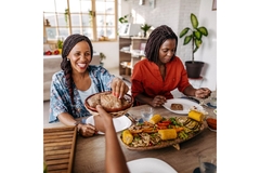 Image Women eating a vegan diet and smiling