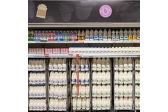 Milk on shelf.
