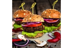Image Plant-based burgers on buns.