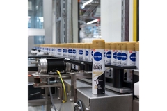 Image A Nivea can in a manufacturing facility.