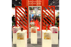 Image DIsplay stands with various products on it during London Packaging Week.