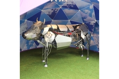 A robot cow representing the idea of milk derived from precision fermentation.
