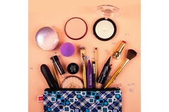 Image A collection of makeup products.