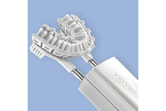 The robotic toothbrush device called Samba created by Curaprox for disabled users.
