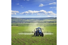 Image Tractor spraying crops.
