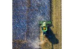 Image Aerial Shot of Green Milling Tractor