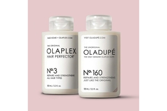 Image A bottle Olaplex No. 3 Hair Perfector next to a bottle of Oladupé.
