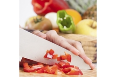 Cutting red bell pepper.