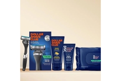 Collection of products from dollar shave club: lotion, shaver, wipes.