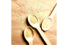 Image Rice grains on three spoons.