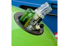 Empty glass bottles in bin.