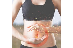 Image Person holding hands for her stomach.