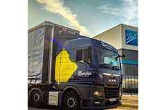 Image Truck in front of production factory.