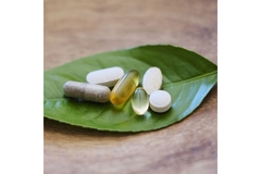 Supplements on a green leaf.