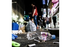 Image plastic pollution caused by littered plastic water bottle and other packaging